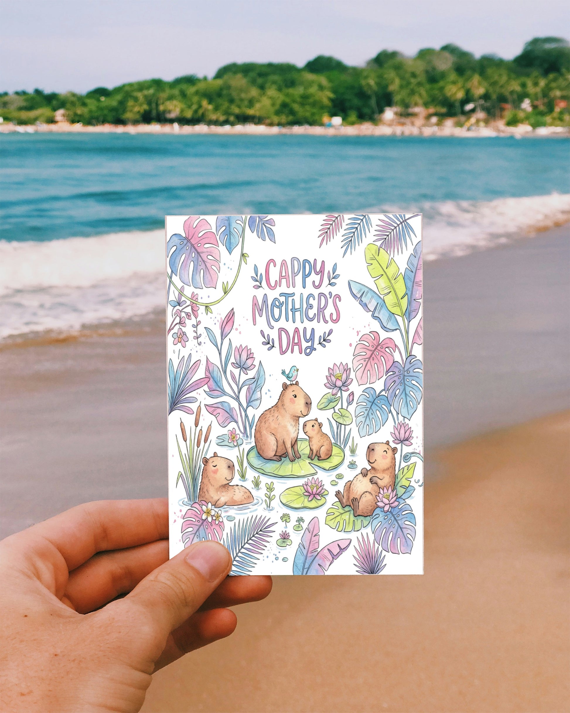 Card with capybaras on a beach with "Cappy Mother's Day" text.